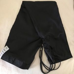 Black satin finish pants with drawstring leg